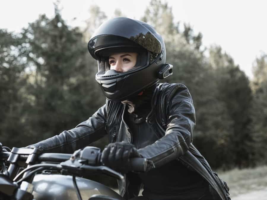 Motorcyclist with full face street helmet