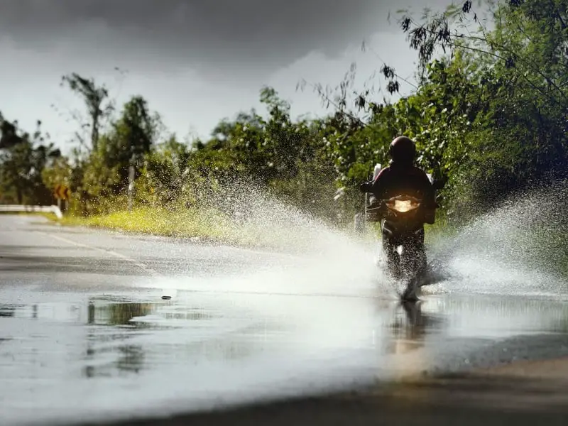 Riding through a puddle with a motorccycle