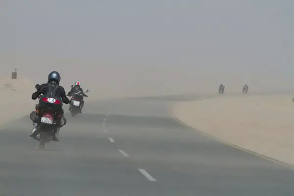 Strong side wind on a motorcycle trip through Namibia